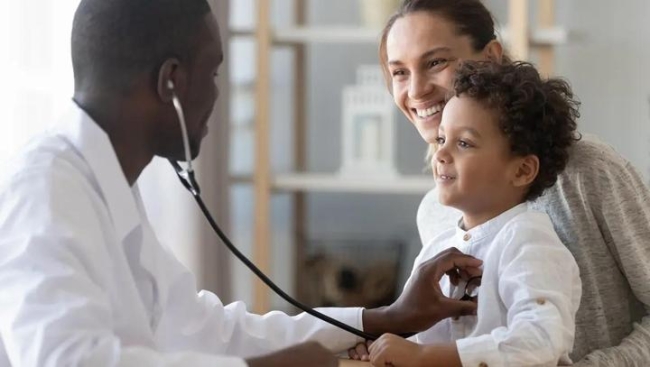 Doctor examining a child