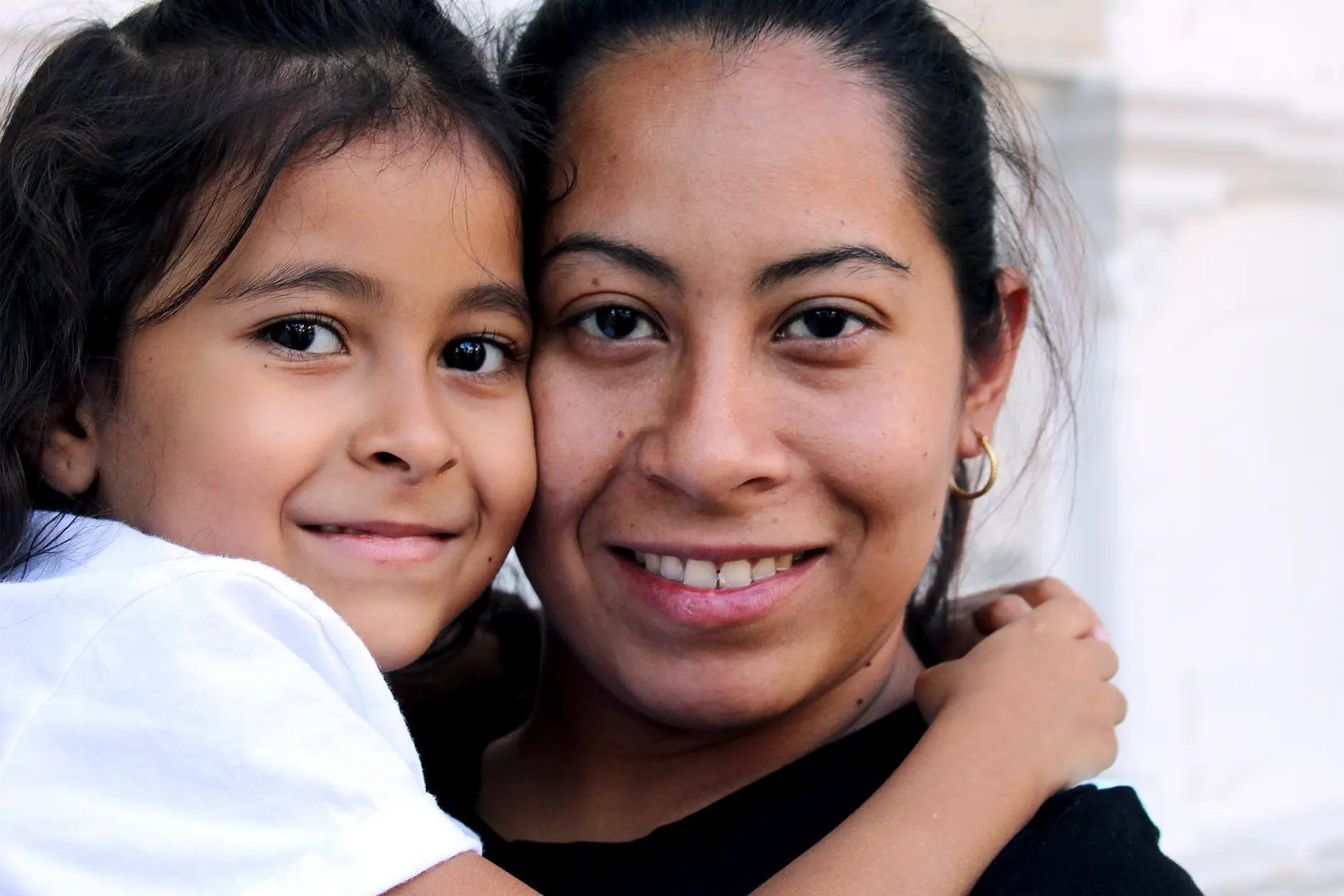 Woman holding a child