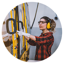 Female worker wearing hearing protection