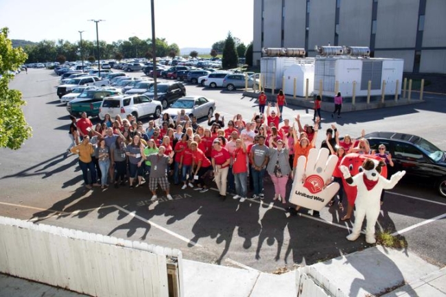 Group of volunteers in a parking lot