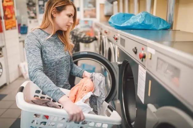 Woman in a laundromat