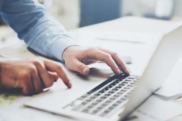 Person working at laptop